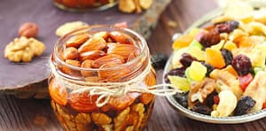 nuts in honey in a jar