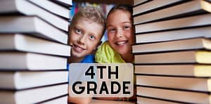 two kids between book piles